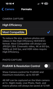 Screenshot of iPhone formats setting showing HEIC High Efficiency vs JPEG Most Compatible option